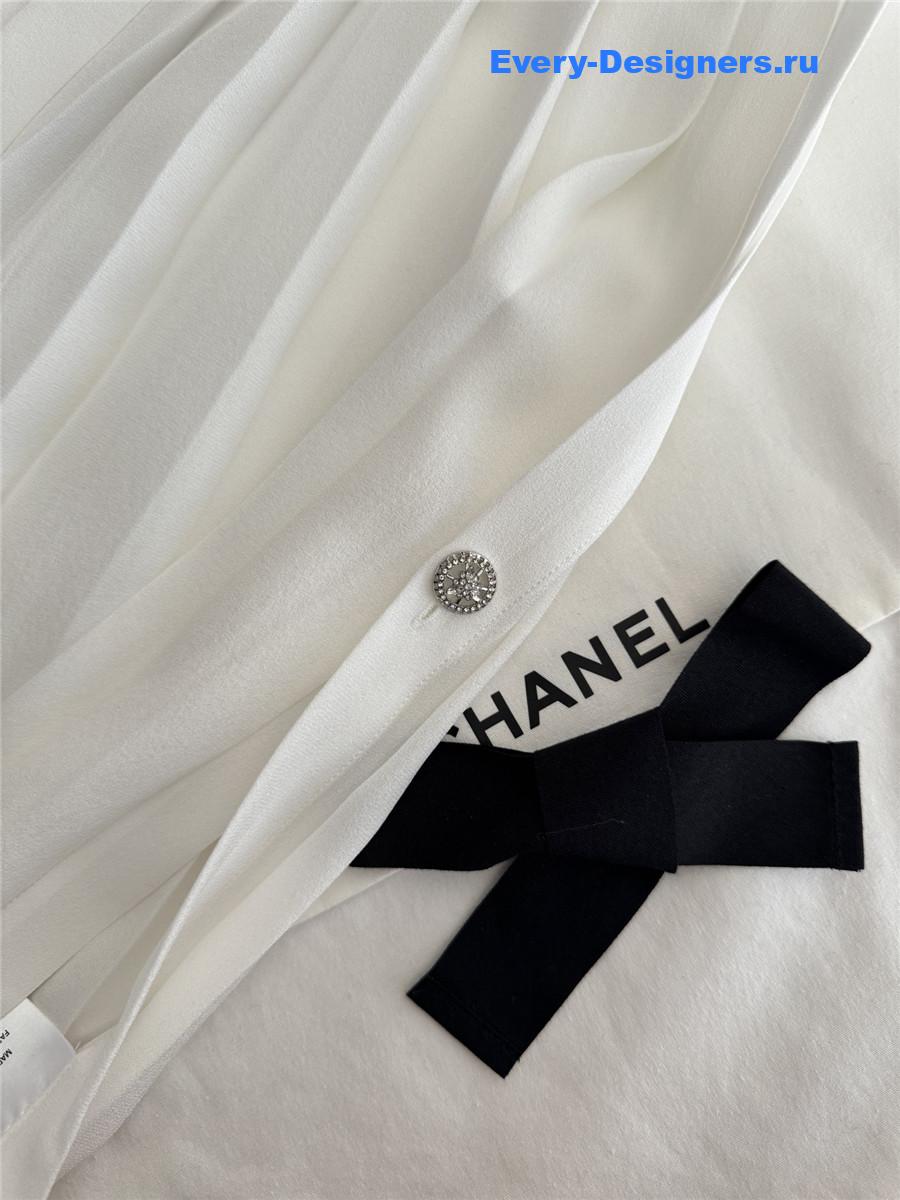 Ch**el white pleated sleeveless top