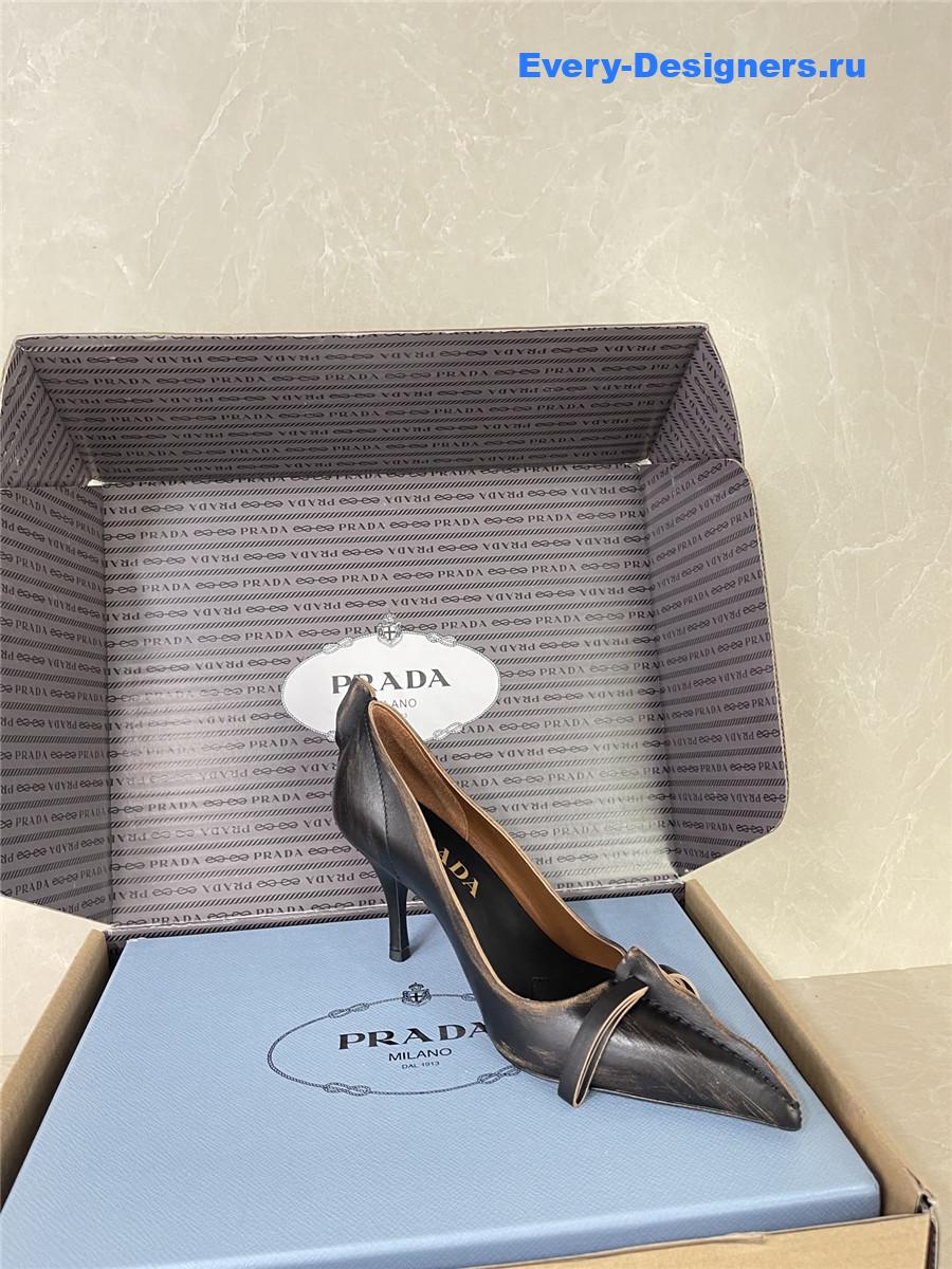 Pra*a black leather bow pumps