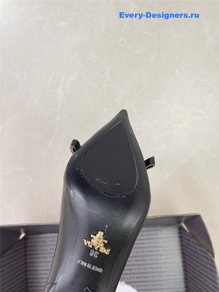 Pra*a black leather bow pumps