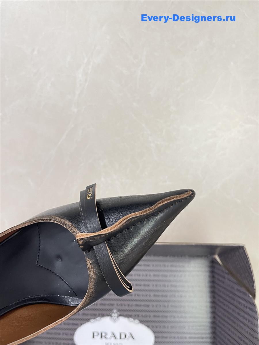 Pra*a black leather bow pumps